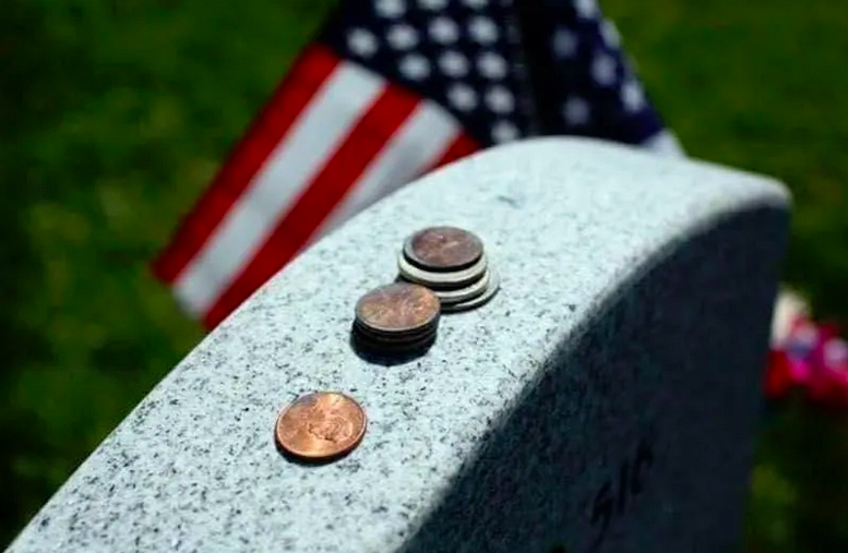 Grave Money: Why do some tombstones have coins on them?